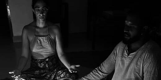Moana, founder of Mayil Wellness, guiding a traditional South Indian healing session